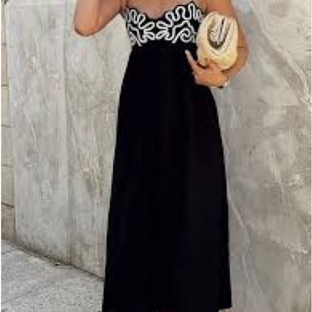 Black Linen Dress with embroidered detail.